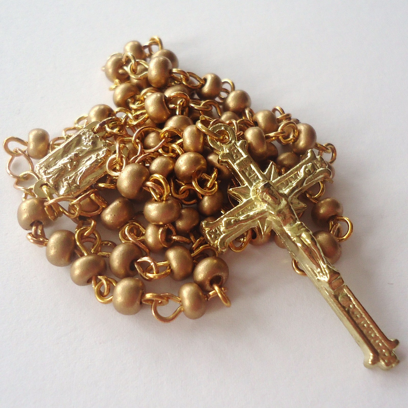 Růženec dětský zlatý