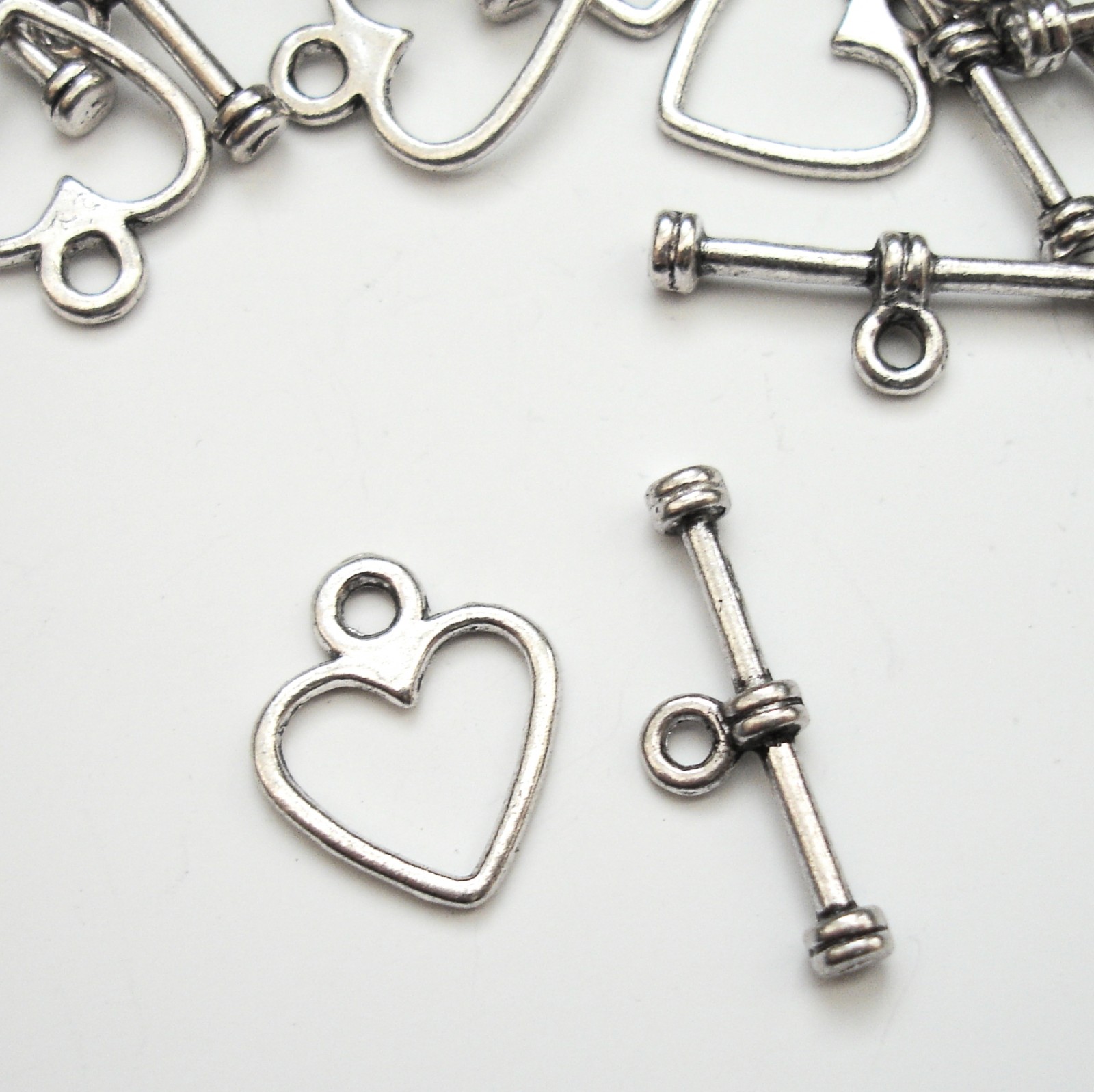 Americké zapínání malé 10mm srdíčko - 4 ks-SS