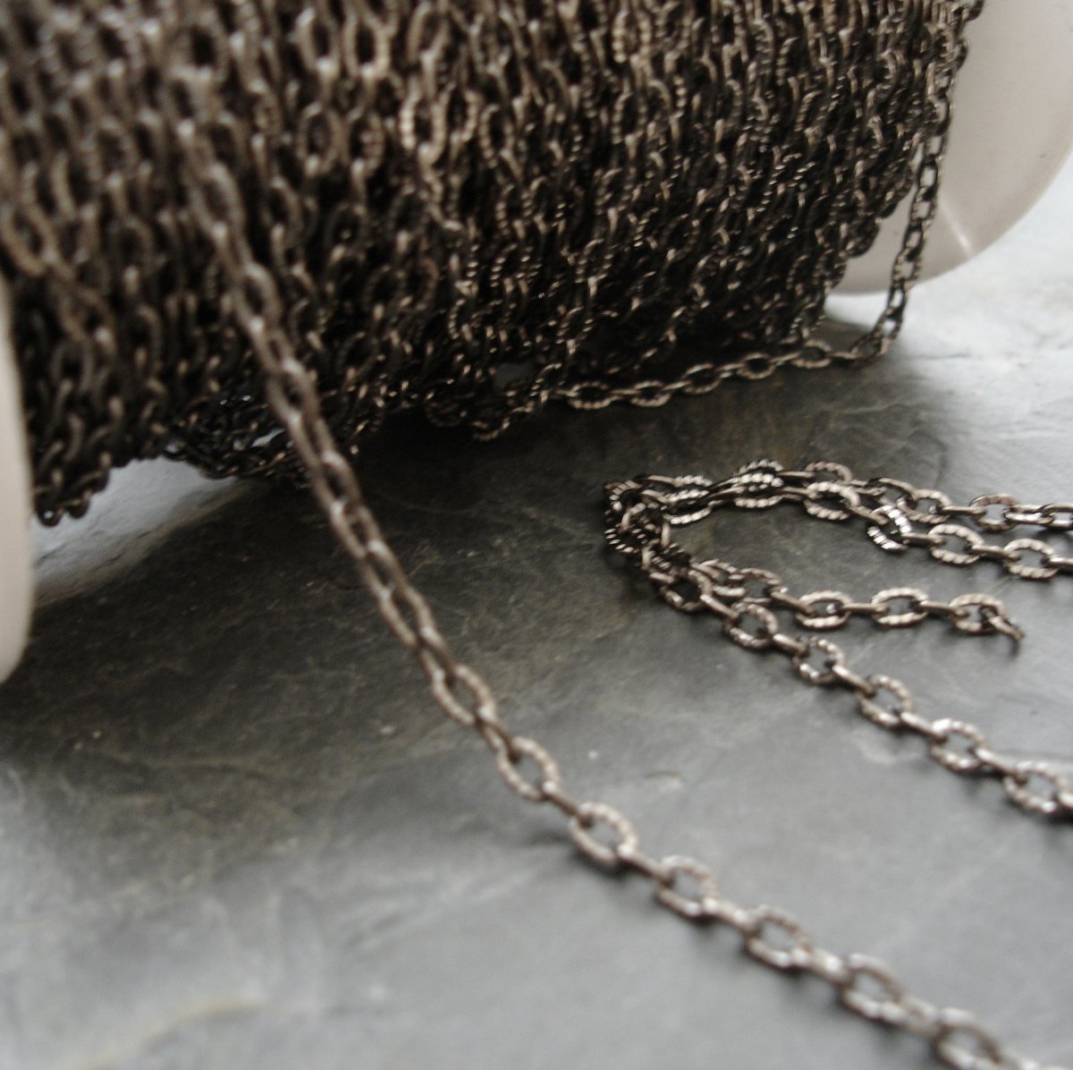 Řetízek cca 3x4 mm - gunmetal - 1 m