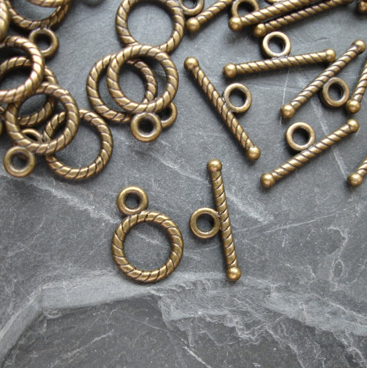 Americké zapínání maličké cca 9 mm - 4 ks - SMO