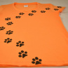 Oranžové dámské triko s kočičími stopami L