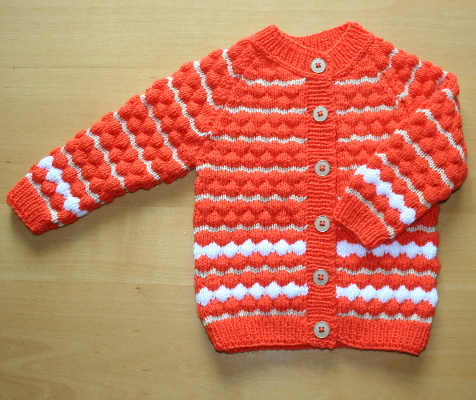 pomerančovo-béžový svetr