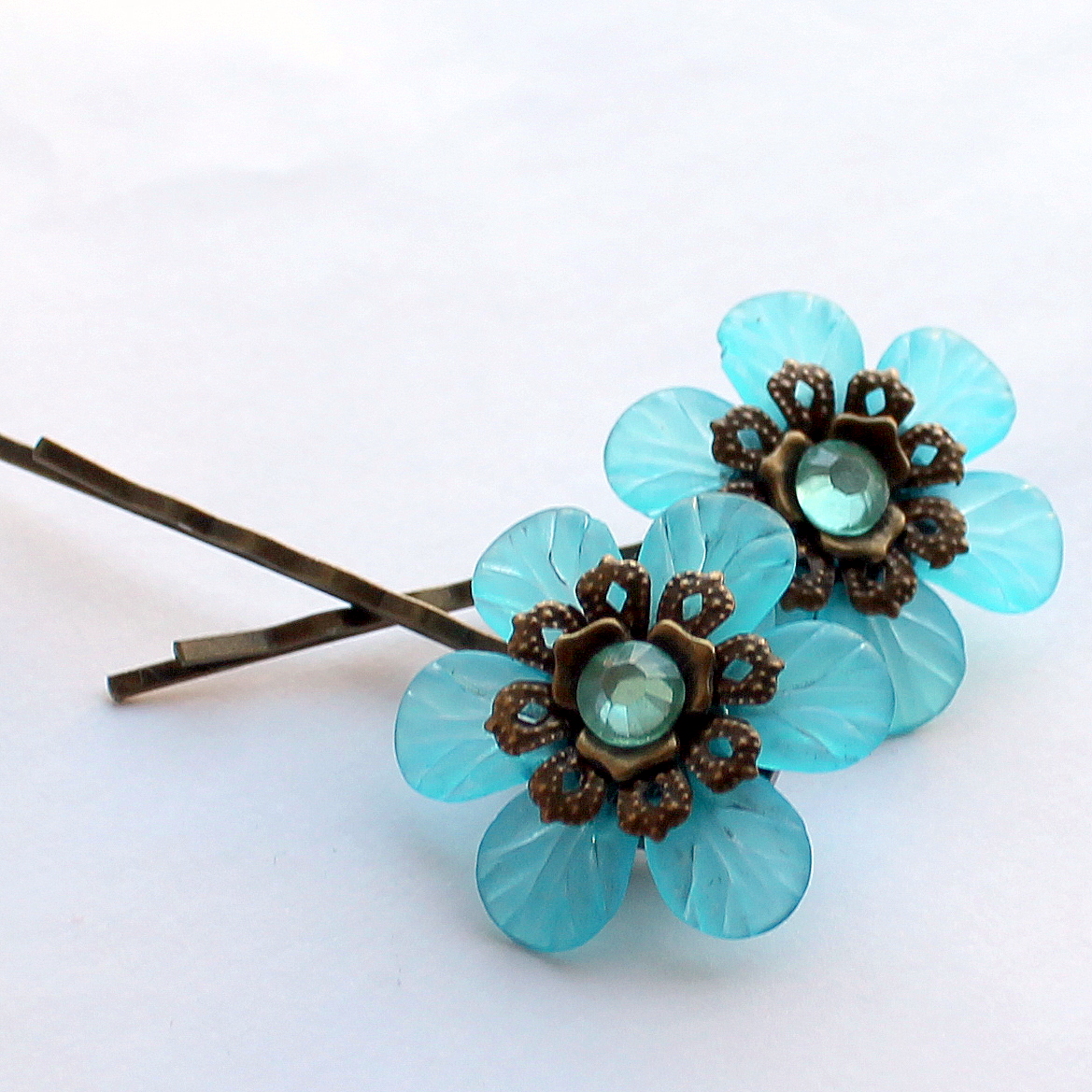 Rozkvetlá pírka do vlasů 1 ks