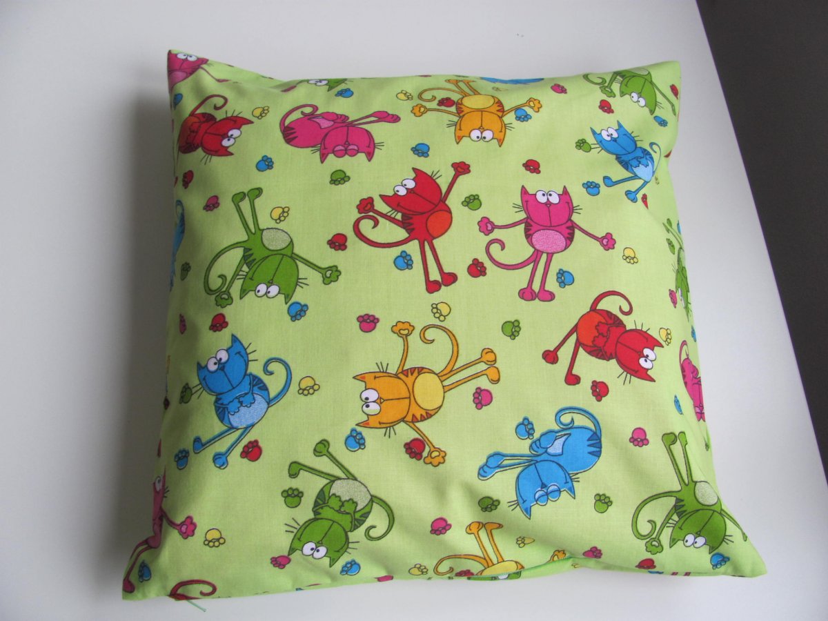 Kocouři na zeleném