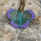 Motýl patinovaný s korálky
