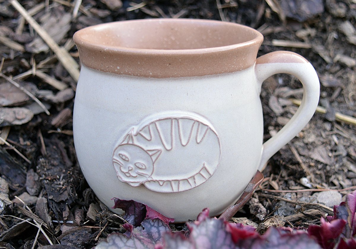 Velký buclák s kočkou.