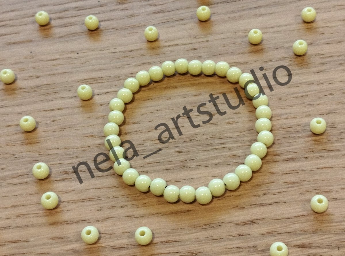 Náramek kulička žlutý