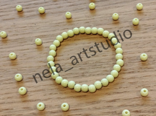 Náramek kulička žlutý