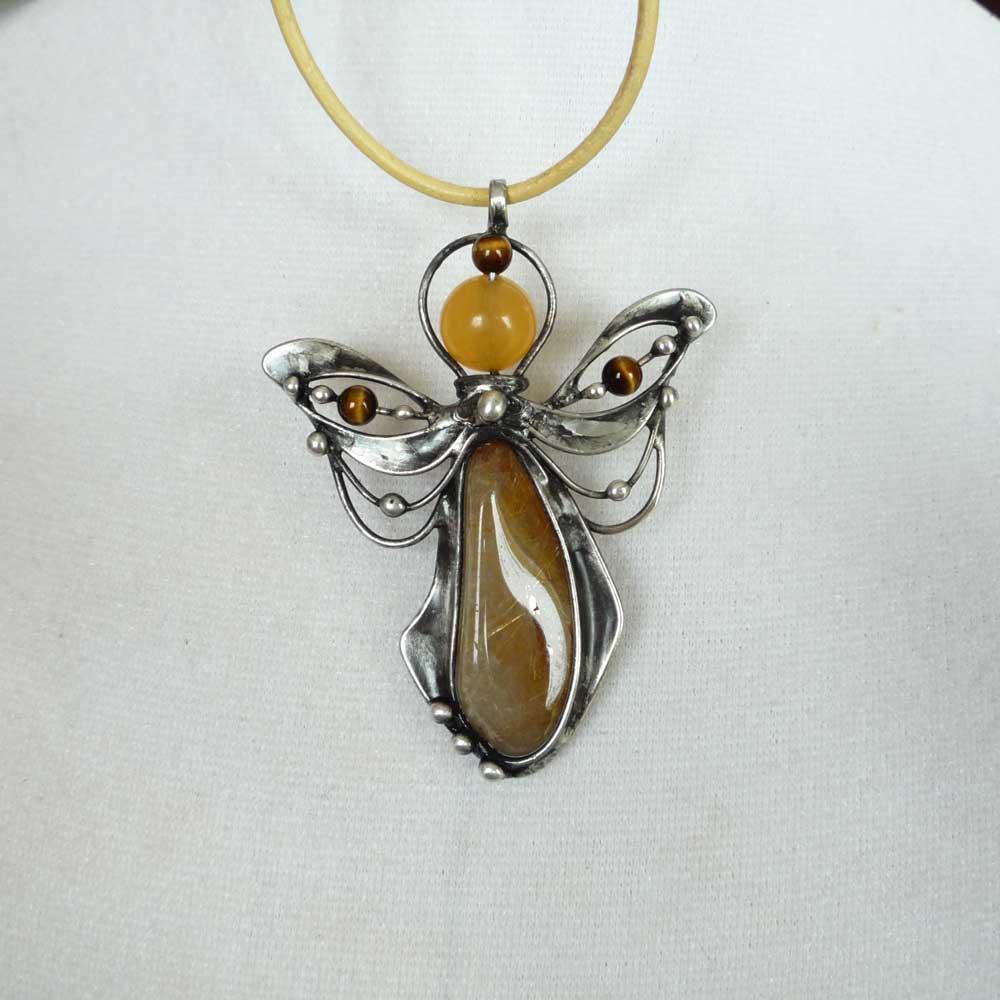 Andílek s kalcitem,sagenitem a tygřím okem