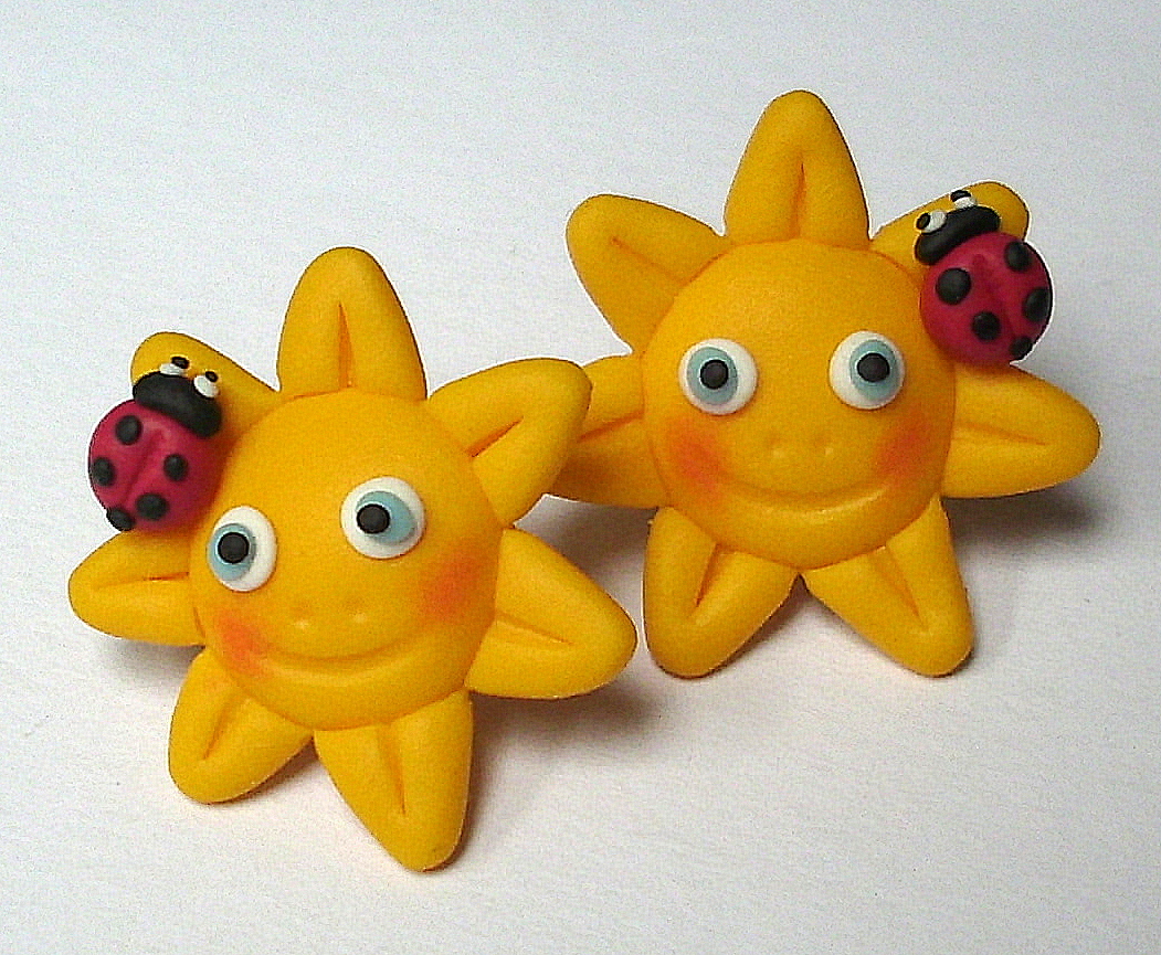 SLUNÍČKA S BERUŠKOU