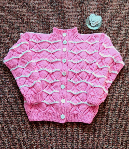 Pletený svetřík - tm.růžový, bílé vlnky